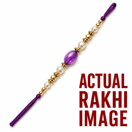 Purple pearl designer Rakhi with large purple centre bead, white pearl-style beads, golden detailing and purple thread