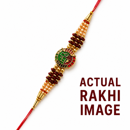 A beaded Rakhi with a central circular emblem featuring the Hindu deity Ganesha, strung on a red cord against a white background, with the text 'ACTUAL RAKHI IMAGE' on the right.